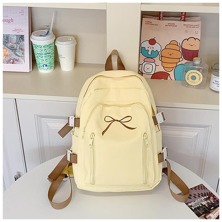 

Милый школьный рюкзак в корейском стиле, универсальный, для учеников средней школы, повседневный, простой, однотонный, с бантом на спине