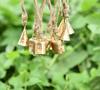 Vintage Gold Cow Bells for Christmas Decor, Pack of 10 Handmade Tin Jingle Bells for DIY Craft Projects and Boho Farmhouse Ornaments