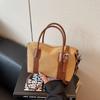 Classic Canvas Duffel Bag with Leather Trim and Adjustable Strap Perfect for Travel and Everyday Use