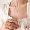 Hong Kong-Style Elegant Heart-Shaped Cat's Eye Stone Pendant Necklace On Gold-Plated Clavicle Chain.