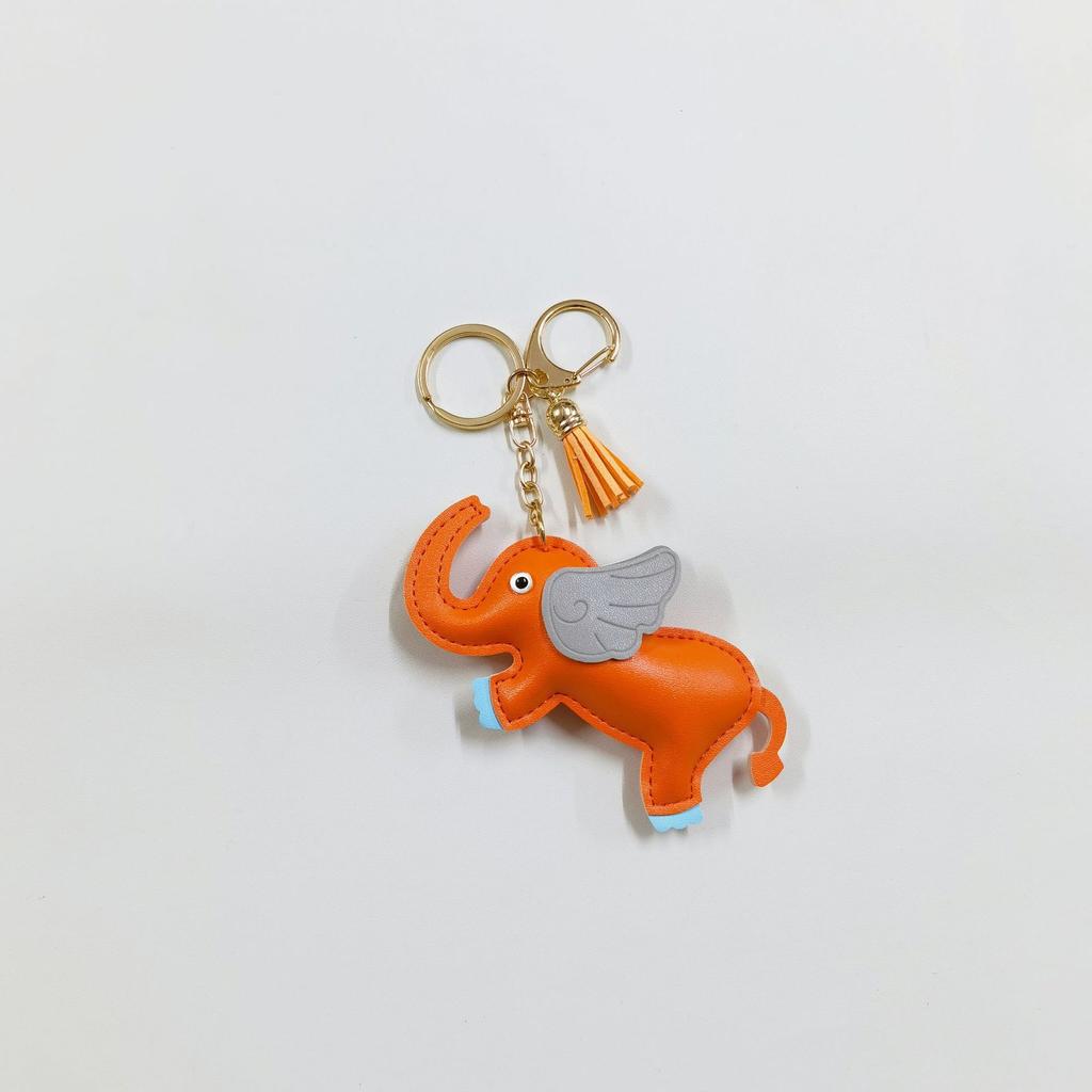Creative flying elephant car keychain pendant leather bag pendant cute personalized car rearview mirror schoolbag pendant