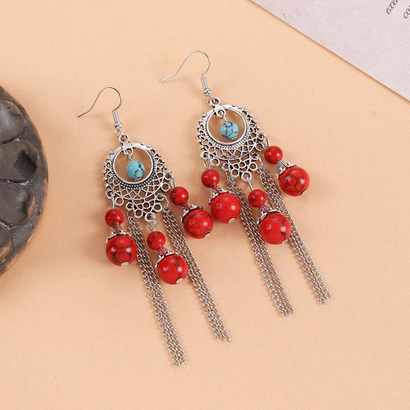 Turquoise fringed earrings women's exotic Tibetan long retro personalized earrings Chinese antique earrings