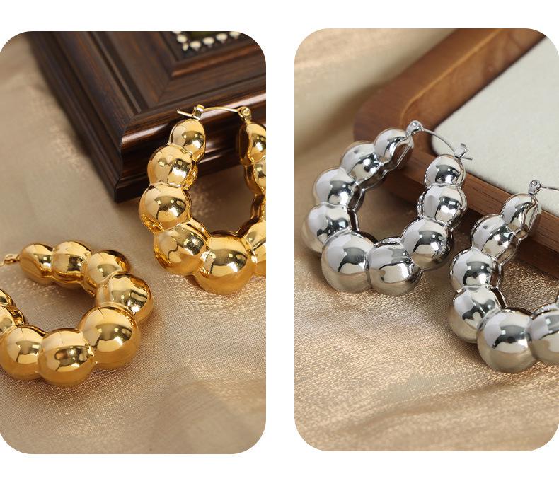 Textured Gold-Plated Titanium Steel U-Shaped Earrings with Steel Ball Design
