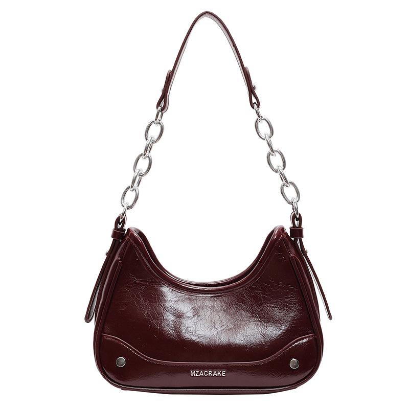 2025 new French fashionable solid color texture shoulder underarm bag women's trend simple personality commuter messenger bag