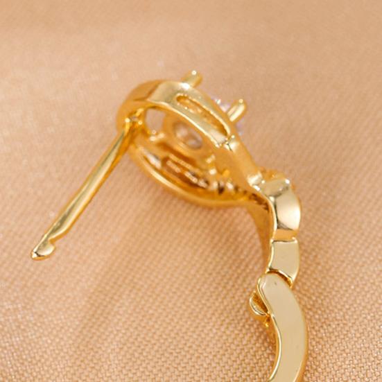 1 Paar Ohrstecker mit glänzenden Strasssteinen und eingelegtem Musiknoten-Design