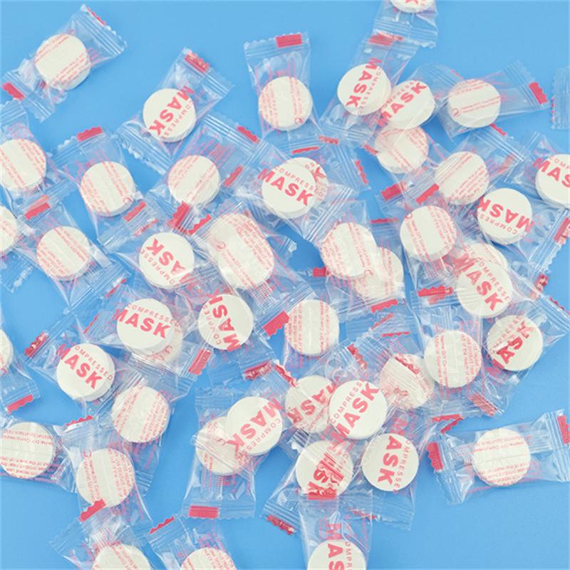 20/50/100PCS Disposable Compressed Facial Mask Non-woven Face Mask Facial Towel Coin Cotton Wrapped Tissues For Beauty Salon