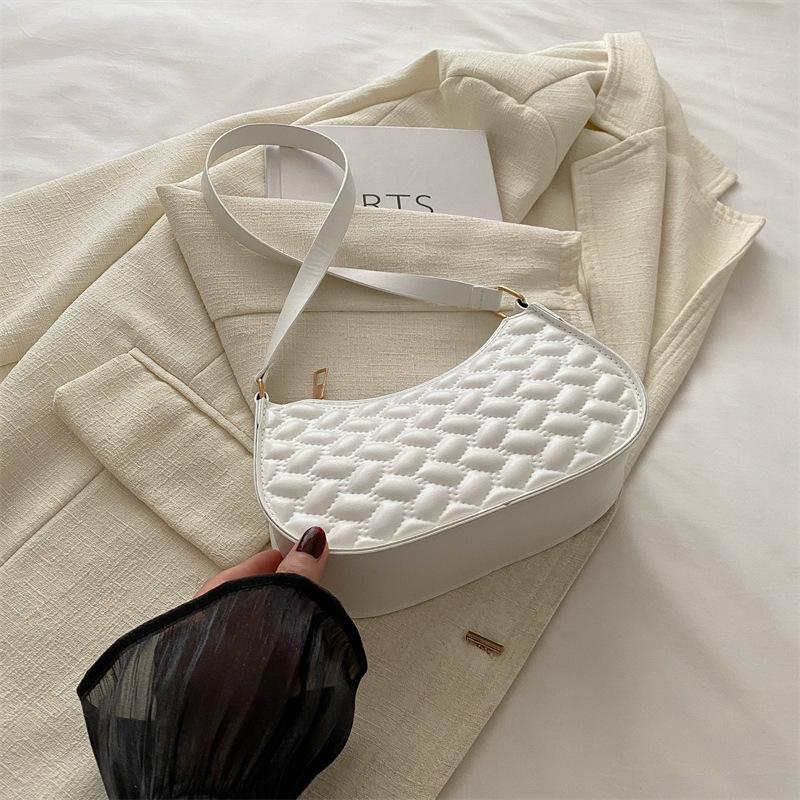 

Fashion casual messenger women s bag new 2024 summer simple fashion shoulder bag niche design foreign style crescent bag білий