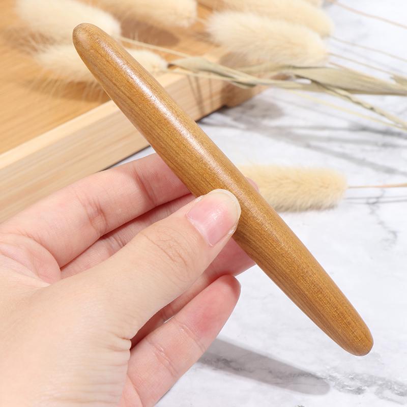 Dřevěná lázeňská masážní tyčinka na tělo uvolňující svalovou bolest