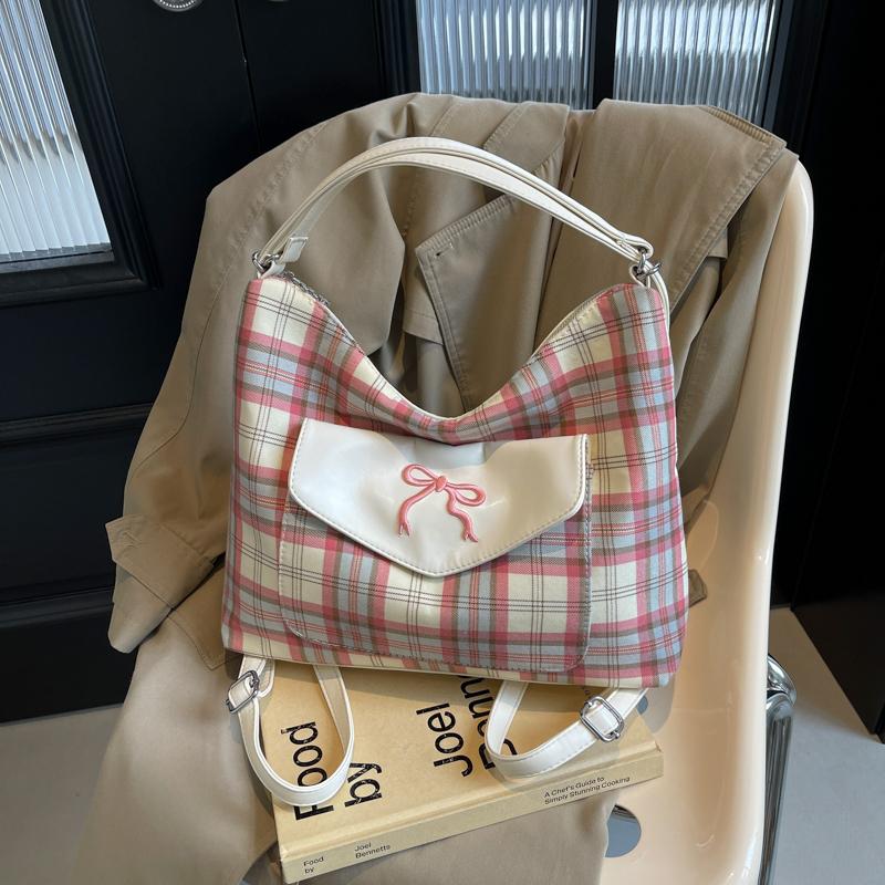 Version kontrastierende gestreifte Tragetasche für Damen Sommer neue Mode Akademie-Stil Schleife einzelne Schultertasche Premium