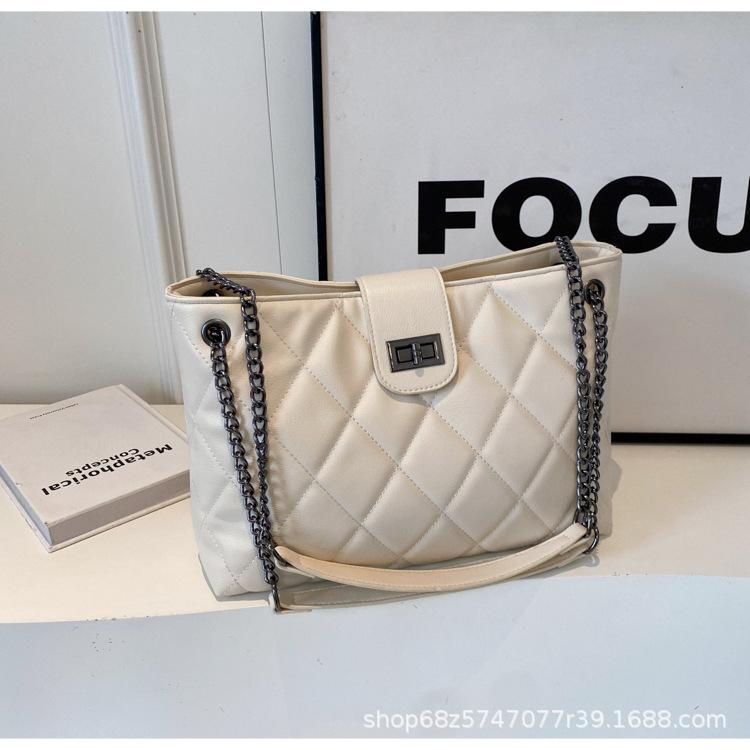 

Commuting to work and commuting large-capacity linger tote bag women s 2025 spring and summer new simple fashion small fragrance shoulder bag бежевый