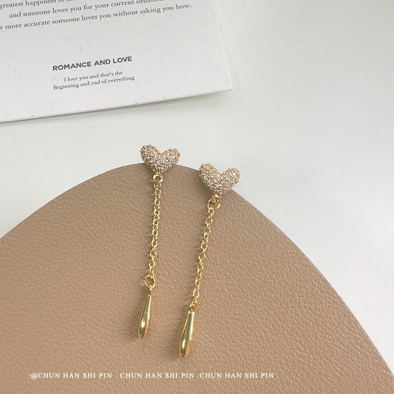 Love tassel mosquito coil plate earrings women's niche light luxury high-end earrings long earrings exquisite ear clips without ear piercings