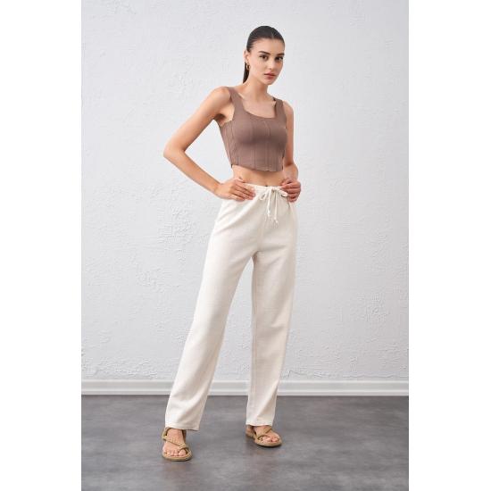 

Женские льняные брюки со шнуровкой и завязкой на талии