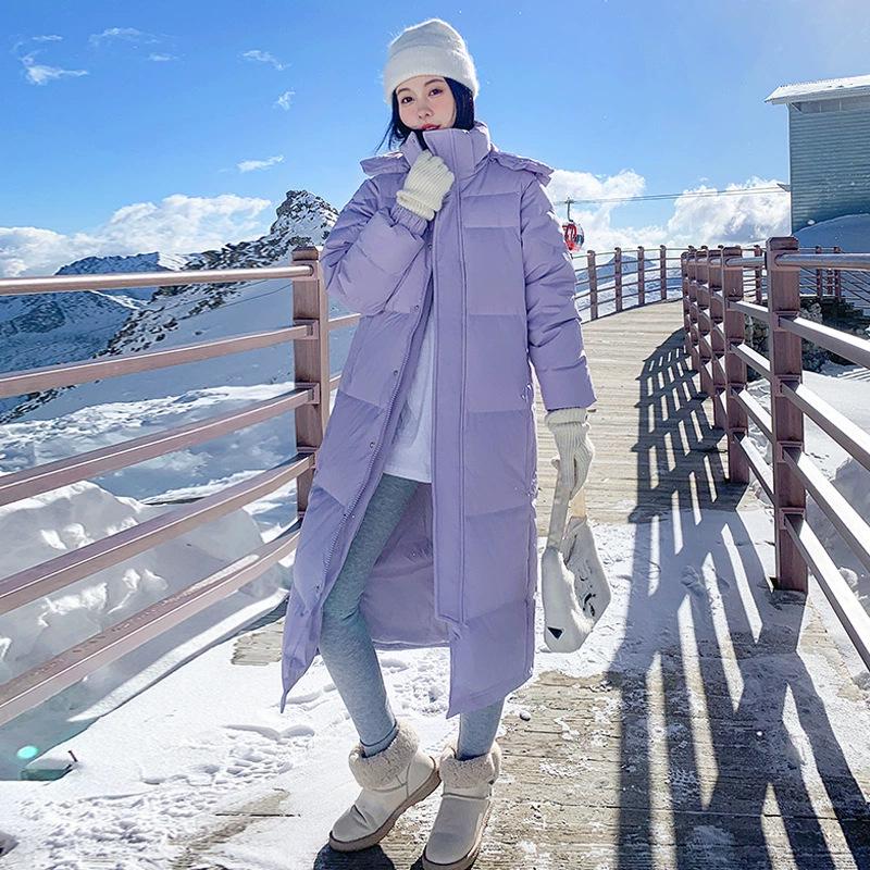 Dámská dlouhá péřová bunda nad kolena - Zima 2025, korejský styl, volný střih, silná výplň z bílého kachního peří, kabát střední délky pro páry