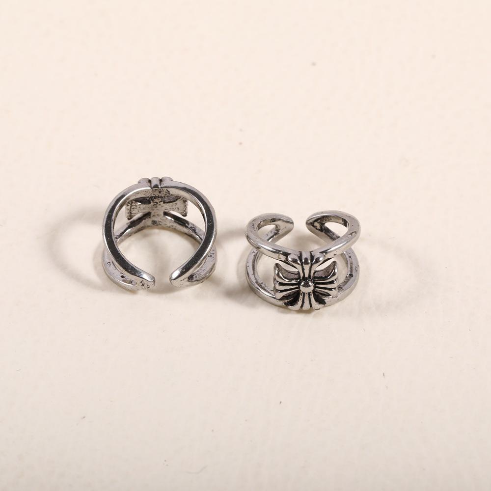 

Vintage Distressed Cross Ear Cuff: Exquisite, Stylish, Adjustable Clip for Couples