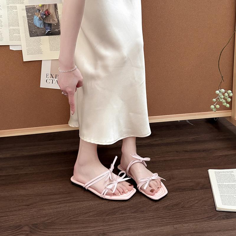 Stylish and simple versatile strap bow with open-toed cool slippers women's 2025 summer new flat-bottomed slippers