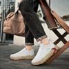 Módní pánské boty 2025 Jaro Nový styl Korejská verze Módní trend Outdoorové cestovní ležérní boty Boční zip Stručně navržené tenisky