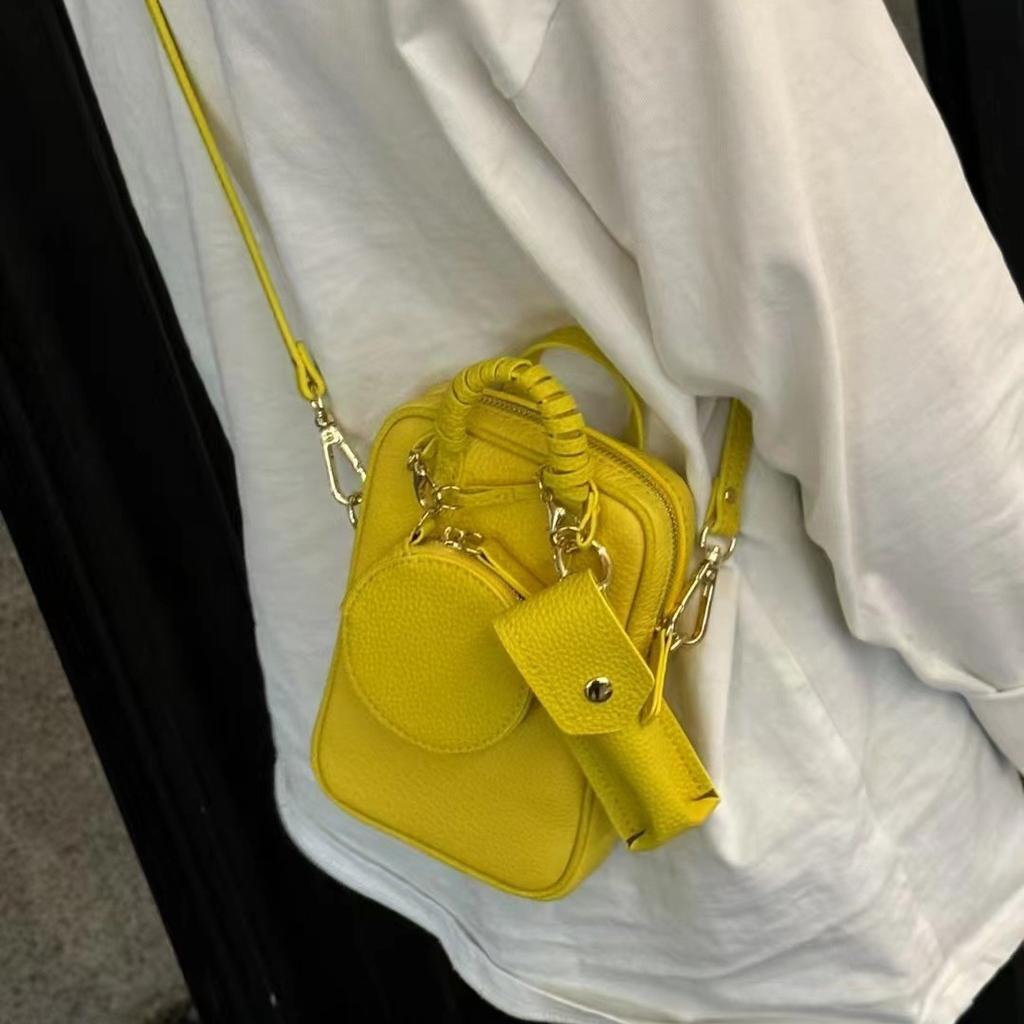 Spring and summer new women's bags niche design change mobile phone bag fashion versatile mini bag cowhide messenger bag