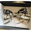Used New, unused CHANEL ribbon barrette