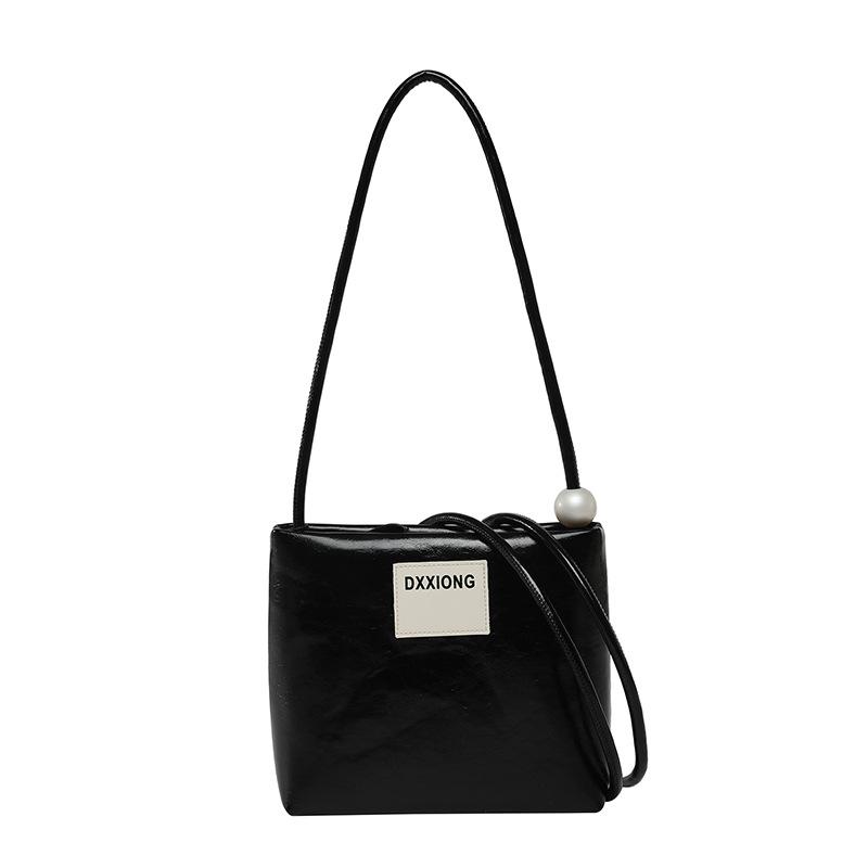 Niche simple design solid color texture mobile phone bag women s versatile commuting high-quality shoulder messenger bag