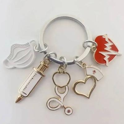 Klíčenka s maskou, Klíčenka pro záchranáře, Klíčenka přívěsek ke Dni sester, Kulatá klíčenka s přívěskem, Kovový přívěsek na klíče, Malý dárek.