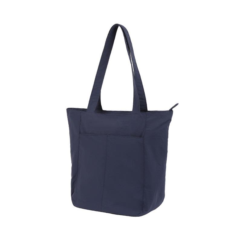 Casual simple large-capacity bag women's new niche versatile shoulder bag class commuter tote bag
