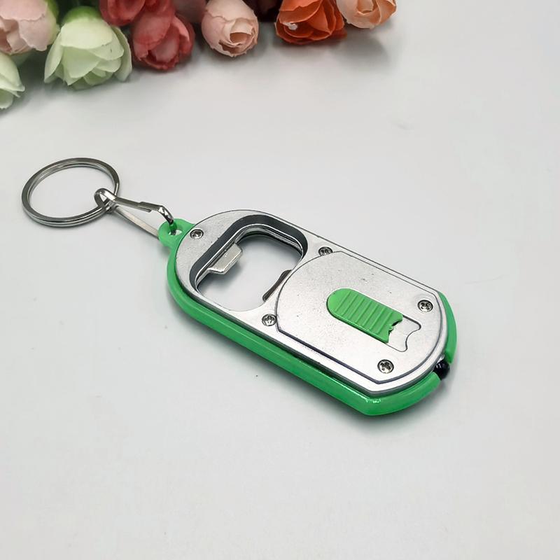 Ouvre-bouteille LED Multifonctionnel Mini Lampe de Poche Illuminée Porte-clés Pendentif