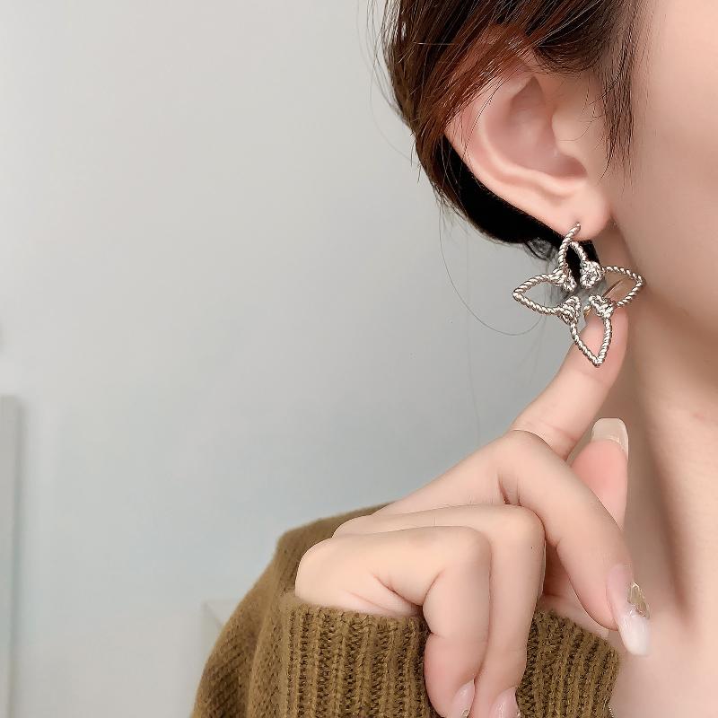 European and American Pentagram Woven Knot Starfish Personalized Creative Design Fashionable Needle Earrings