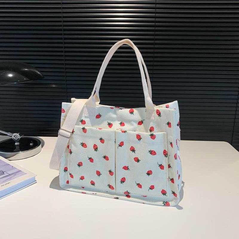 New Summer Style Portable Large Capacity Casual and Personalized Shoulder Bag Beautiful Simple Fashion College Style Tote Bag