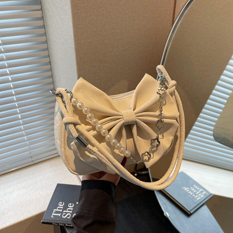 Portable high-end messenger bag women's summer new fashion versatile pleated bow chain bag