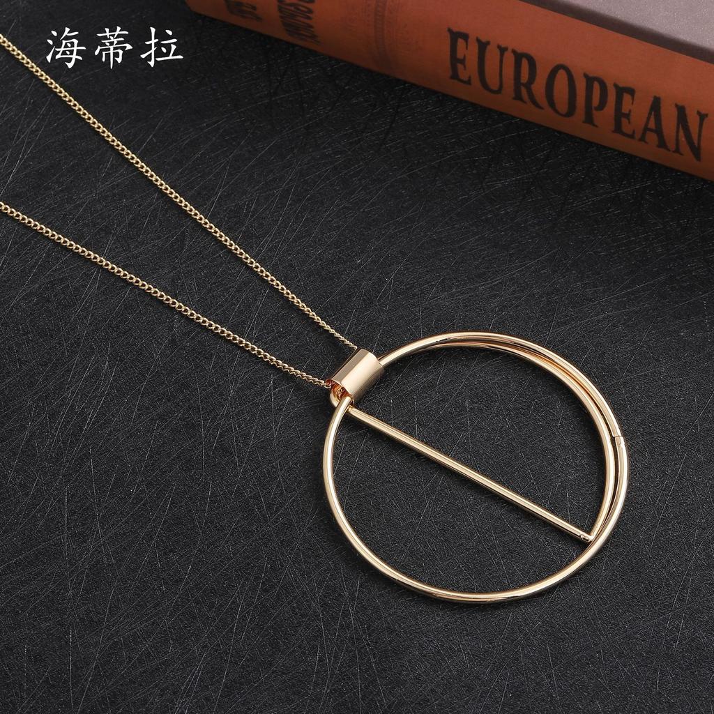 New Gold Hollow Ring Pendant, Fashionable and Simple Women's High-end Long Banquet Sweater Chain