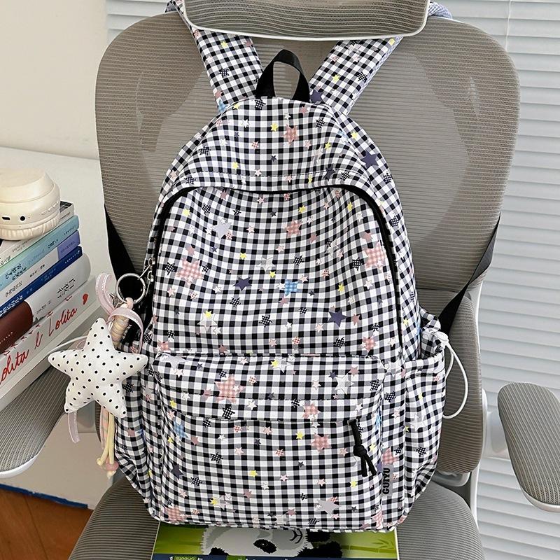 Schoolbag new schoolbag female junior high school student star printing Korean version niche ins backpack Mori college student computer bag