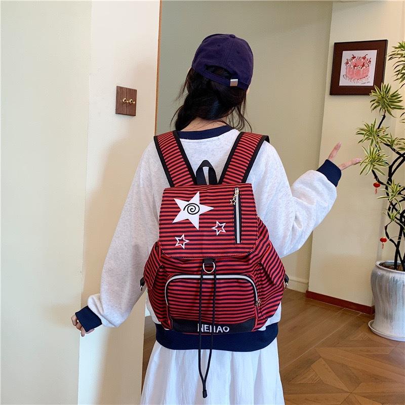 Schoolbag Korean version ins cartoon star backpack bag female niche design fashion striped large capacity casual student schoolbag