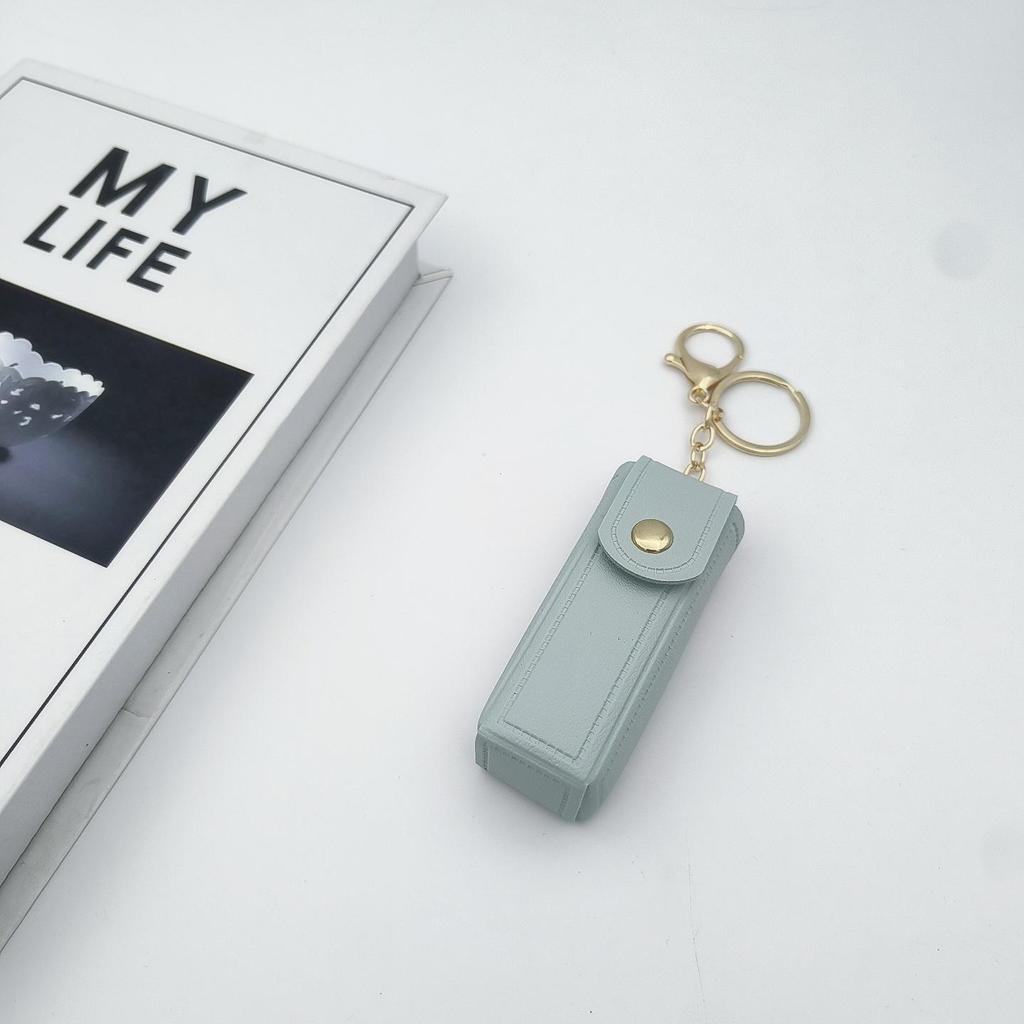 Přenosné pouzdro na rtěnku ve tvaru srdce s ochrannou kůží a roztomilou klíčenkou s přívěskem