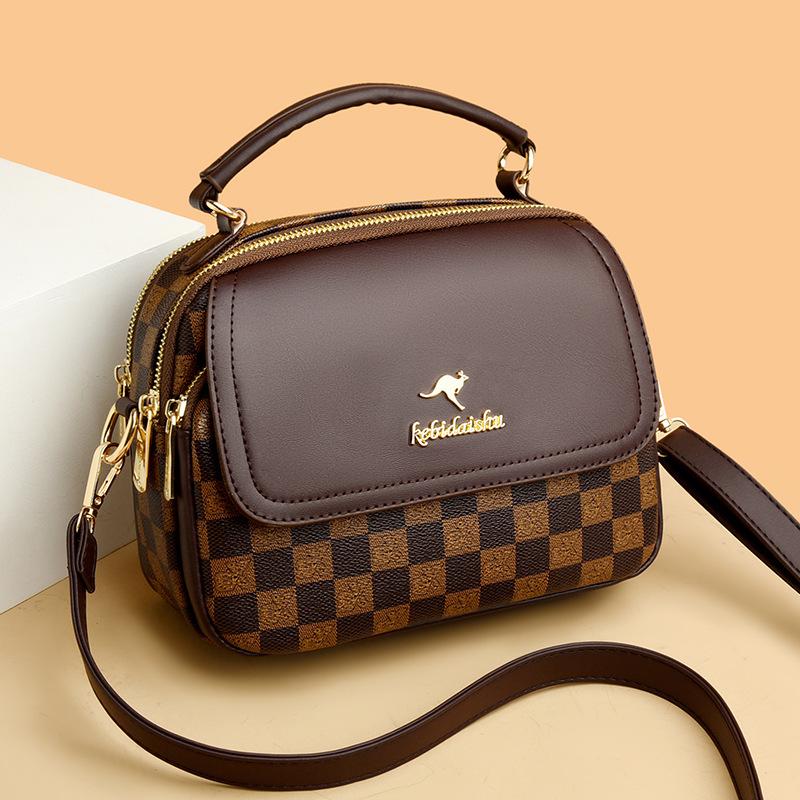 

Women s bag, messenger bag, high-end women s handbag, shoulder bag, women s present 23cm*18cm*12cm коричневый