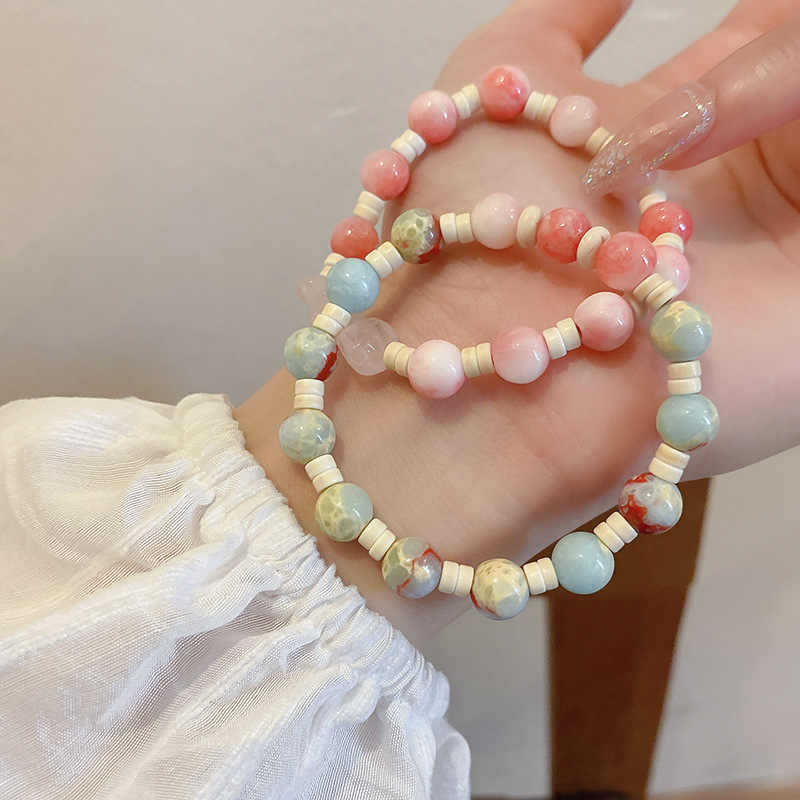 Colored stone rice bead stone elastic bracelet light luxury high-end sense niche design temperament fashionable versatile exquisite jewelry women