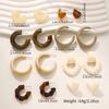 Europe and the United States Hot-selling Love Twist Splicing Paint Earrings Niche Exaggerated Earrings Women's Combination Set