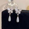 Korean Style White Pearl Butterfly Tassel Earrings for Women - Elegant, Versatile, High-End Feel, Niche Ear Jewelry.