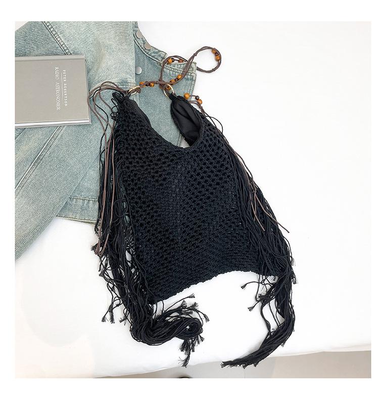 

2025 new retro fringed bag women s hollow woven bag new commuter shoulder versatile tote beach bag tide