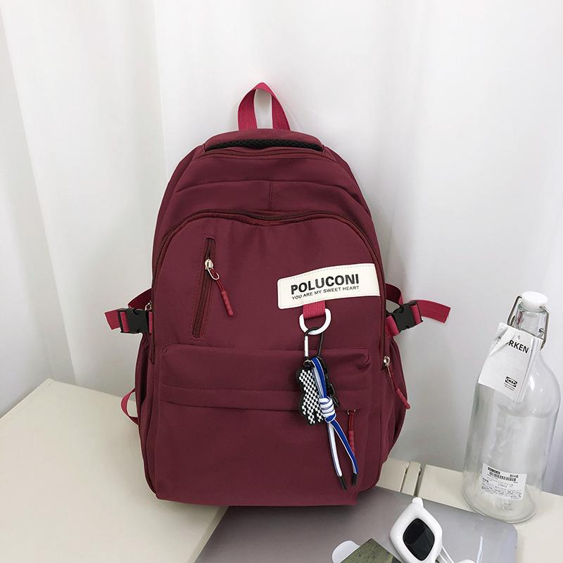 

Solid color schoolbag student large capacity college style backpack simple leisure sports Korean version couple backpack travel bag No pendant бордовый