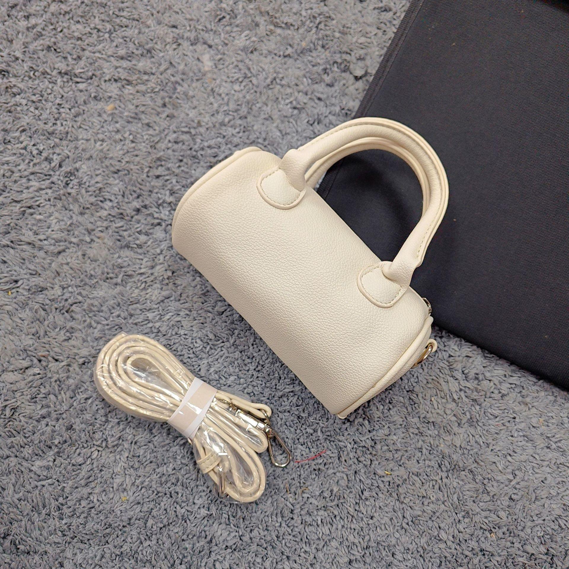 

Niche Design Bag Women S Fashion Boston Bag Portable Small Round Bag High-End Cylinder Messenger Bag белый