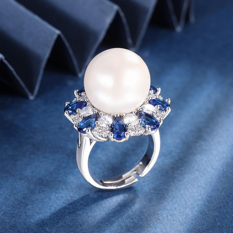 

New European and American fashion simulation sapphire blue red corundum emerald surrounding pearl ring for women