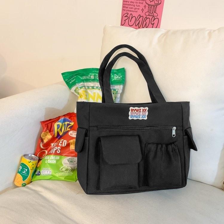 

Versatile And Chic Large Capacity Tote Bag For Women Available In White Purple And Black чорний