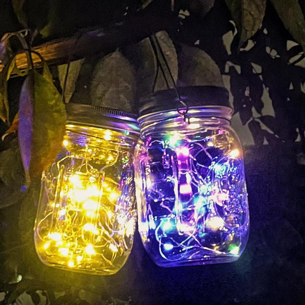 Rainproof Solar Mason Jar Wish Light for Garden, Balcony, and Villa Decor.