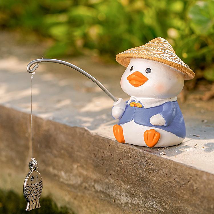 Creative Aquarium Decoration: Cute Animal Fishing Ornaments with Waterfall Rockery for Fish Ponds