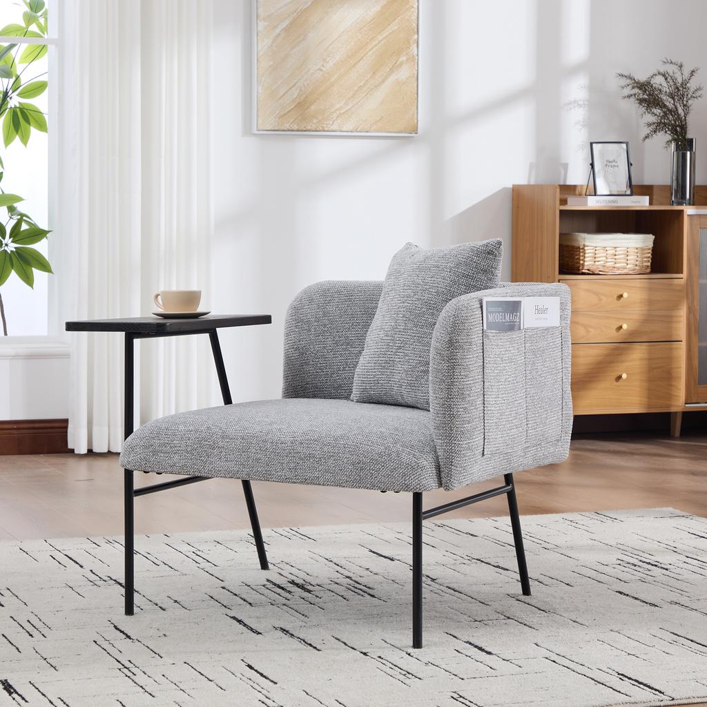 Modern single armchair with comfortable fabric backrest and two storage compartments, complemented by a practical side table.