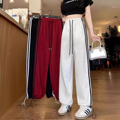 Pantalones deportivos americanos de tres vías para mujer para primavera y otoño, nuevos pantalones casuales de pierna ancha pequeña sueltos con cordón y rayas