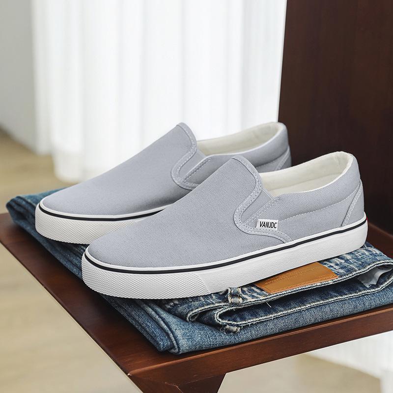 Chaussures Slip-On en toile unisexes 2026: Chaussures plates d'été décontractées style coréen pour étudiants et couples.