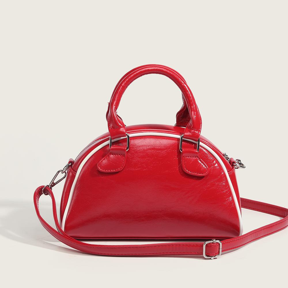 Red hard and three-dimensional striped tote bag with a sense of luxury, suitable for crossbody or hand-held use.