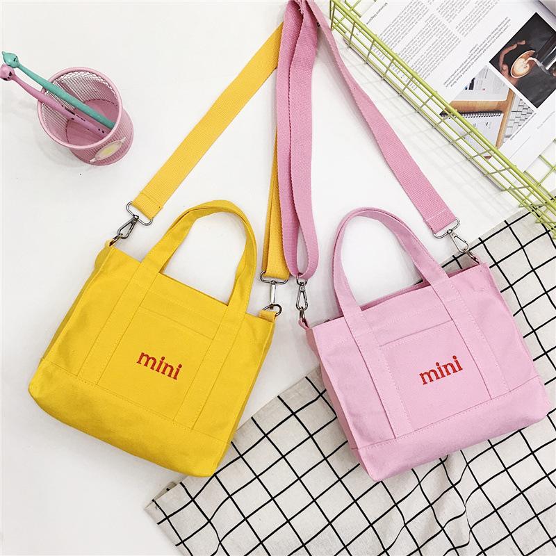 Fashion 2019 new dual-purpose canvas bag, fresh and casual simple letter student shoulder oblique span bag