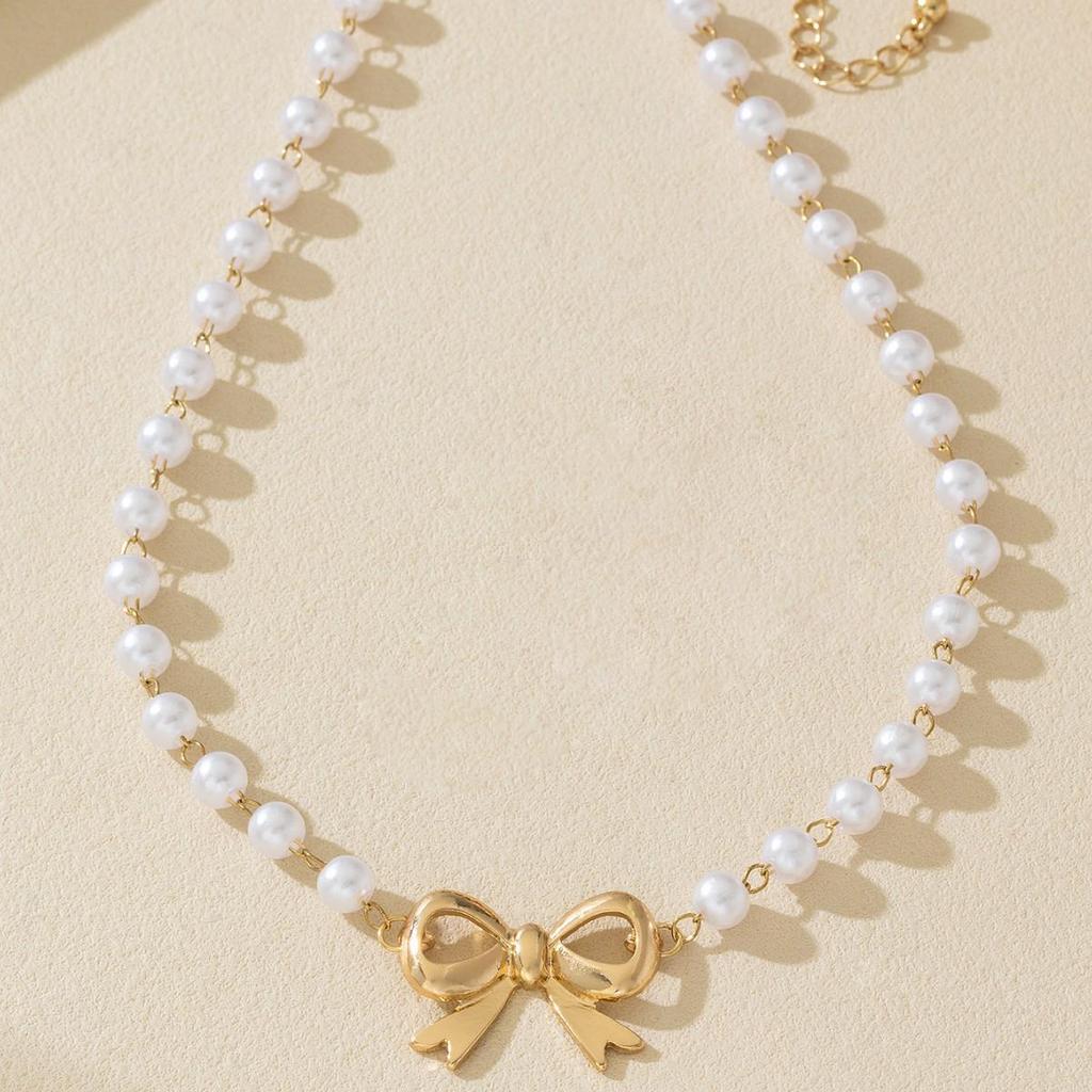 Elegant French Pearl Bow Choker Necklace for Women - Lightweight and Stylish